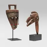 African, Mask and puppet head, carved wood, steel, string
