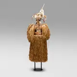 Asmat, Jipae Baju Setan (Ghost Armor) ceremonial body mask, sago palm leaves, rattan, Fum rope, carved and painted wood, feathers, beads, seeds, vegetable fiber