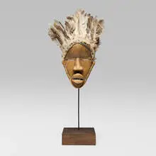 Mask by Dan, wood, feathers, cloth, natural fibers, sold Jul 2025