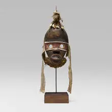 Gunyege mask by Dan, wood, leather, feathers, upholstery, natural fibers, teeth, sold Jul 2025