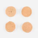 George E. Ohr, Collection of four brothel tokens, c. 1900, bisque earthenware
