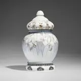 Reticulated covered vessel with orchids by Jo Hahn Locher for Bing & Grøndahl, 1902-14, carved and glazed porcelain, sold Feb 2026