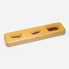 A-Z Sorting Tray by Andrea Zittel, 2001, birch, paint, sold May 2025