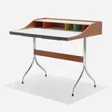 Swag Leg desk by George Nelson & Associates, 1954, walnut, chrome-plated steel, laminate, lacquered wood, sold May 2025