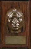 Cyrus Edwin Dallin, Sioux Head (Phillip Son of Kicking Bear), Bronze with greenish brown patina mounted on wood panel and with name plaque