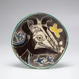 Pablo Picasso, Tête de chèvre en profil (Goat's Head in Profile) (R. 151), 1952, White earthenware round plate painted in colours with partial brushed glaze