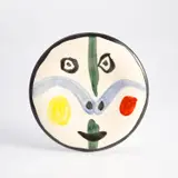 Visage no. 0 (Face no. 0) (R. 458) by Pablo Picasso, 1963, White earthenware round plate painted in colours and glazed, sold Sep 2022