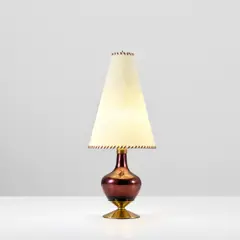 Table lamp by Max Ingrand, circa 1955, Coloured mirrored glass, brass, leather, paper shade, sold May 2022