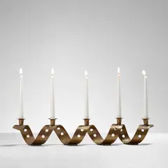 Jean Royere, 'Perforation' candle holder, circa 1945, Brass