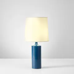 Table lamp by Georges Jouve, circa 1960, Glazed earthenware, fabric shade, sold May 2022