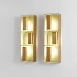 Pair of 'Finestra' wall lights, model no. 12664 by Gio Ponti, circa 1957, Brass, painted brass, painted steel, sold May 2022