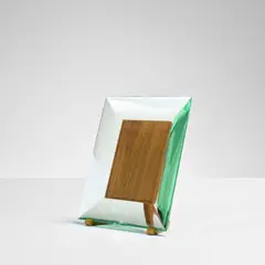 Frame, model no. 1242 by Pietro Chiesa, circa 1946, Glass, teak, sold May 2022
