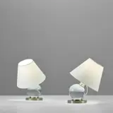 Jacques Adnet, Pair of adjustable table lamps, model no. 7706