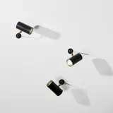 Serge Mouille, Set of three adjustable 'Tuyau' wall lights, circa 1955, Painted aluminium, painted steel, brass
