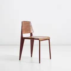 'Chaise no. 4' by Jean Prouvé, circa 1934, Birch plywood, painted steel, brass, offered May 2022