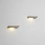 Arne Jacobsen, Pair of wall lights, model no. 34505, circa 1967, Stainless steel