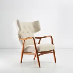 Nils and Eva Koppel, Wingback armchair, circa 1947, Fabric, stained beech