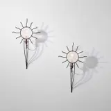 André Dubreuil, Pair of 'Soleil' wall-mounted candle holders