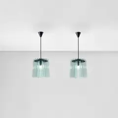 Pair of chandeliers by Fontana Arte, circa 1958, Glass, painted brass, sold May 2022