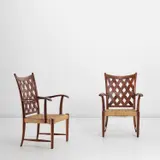 Mario Passanti, Pair of armchairs, circa 1940, Stained chestnut, rush