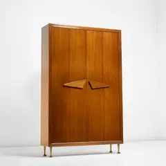Illuminated wardrobe by Gio Ponti, early 1950s, Mahogany-veneered wood, mahogany, glass, brass, offered May 2022