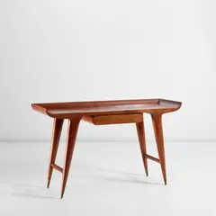 Console table by Gio Ponti, circa 1947, Walnut, walnut-veneered wood, brass, sold May 2022