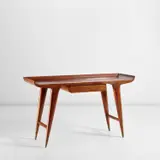 Console table by Gio Ponti, circa 1947, Walnut, walnut-veneered wood, brass, sold May 2022