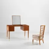 Dressing table and chair by Gio Ponti, circa 1938, Walnut, walnut-veneered wood, mirrored glass, brass, leather, fabric, sold May 2022
