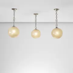 Seguso, Set of three ceiling lights, 1940s, Coloured pulegoso glass, nickel-plated brass