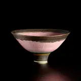 Footed bowl by Lucie Rie, circa 1980, Porcelain, inlaid pink radiating lines, turquoise and manganese bands, sold Nov 2022