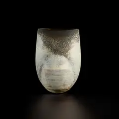 Ovoid form with flattened cylinder by Hans Coper, circa 1969, Stoneware, porcelain slips and engobes over a textured and incised body, the interior with a manganese glaze, sold Nov 2022