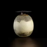 Hans Coper, Large ovoid pot with disc top, circa 1967, Stoneware, porcelain slips and engobes over a textured and incised body, the neck, lip and interior with a rich manganese glaze
