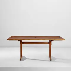 Extendable trestle table by George Nakashima, designed 1944, executed 1958, American black walnut, East Indian rosewood, sold Nov 2022