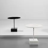Pair of side tables by Ettore Sottsass, circa 1983, Marble, painted steel, sold Nov 2022