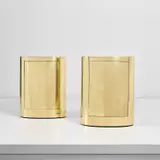 Gabriella Crespi, Pair of 'Bar Ovale' cabinets, from the 'Menhir' series, designed 1976, produced 1979, Brass-covered wood, plastic-laminated wood