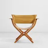 Rena Dumas and Peter Coles, Folding armchair, from the 'Pippa' series, designed 1986, produced circa 1991, Pearwood, leather, brass