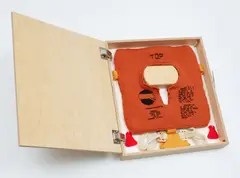 Tools for Warmth and Departure by Doug Aitken, 2003, wool and photographs, in artist’s wooden box, offered Oct 2022