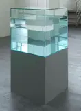Ann Veronica Janssens, Cocktail Sculpture, 2008, distilled water and paraffin oil in glass on painted wooden base