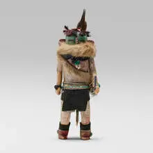 Zuni, Katsina doll representing Hehe'a, the Blunderer, c. 1945, wood, natural pigments, yarn, beads, leather, ruff, feathers, turquoise, metal