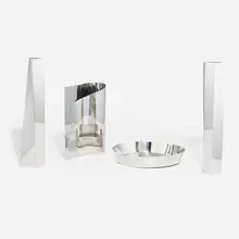 Alessi, Collection of four tabletop accessories, stainless steel