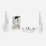 Alessi, Collection of four tabletop accessories, stainless steel