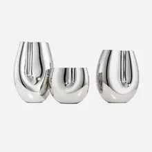 SkLO, Collection of three Seam vessels, hand-blown glass