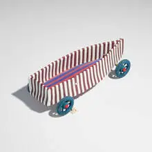 Wheeled Vessel by Richard Marquis, 2002, glass, wood, brass, plastic, half dice, sold Jan 2026