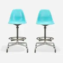 Charles and Ray Eames, Drafting stool model 622NS, pair, molded fiberglass, cast aluminum, lacquered steel, stainless steel