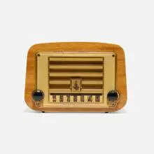 Charles and Ray Eames, Radio, model 578A, 1946, mahogany plywood, plastic, Bakelite