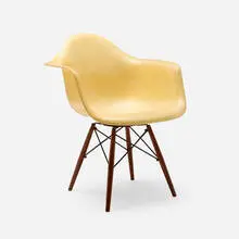 Charles and Ray Eames, DAW, 1951, molded fiberglass with rope edge, walnut, enameled steel, rubber