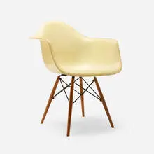 DAW by Charles and Ray Eames, 1951, molded fiberglass with rope edge, birch, enameled steel, rubber, sold May 2025
