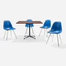 Charles and Ray Eames, Dining set, lacquered molded fiberglass, vinyl, zinc-plated steel, aluminum, lacquered steel, walnut veneer, rubber, plastic