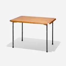 Rare Early table by Charles and Ray Eames, c. 1945, molded birch plywood, painted aluminum, rubber, sold May 2025