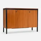 Black Frame cabinet by George Nelson & Associates, 1956, teak, lacquered wood, lacquered steel, sold May 2025